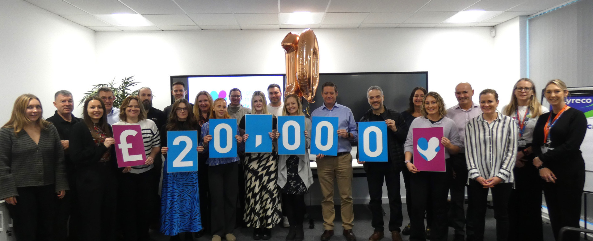 Celebrating raising £20,000 for charity