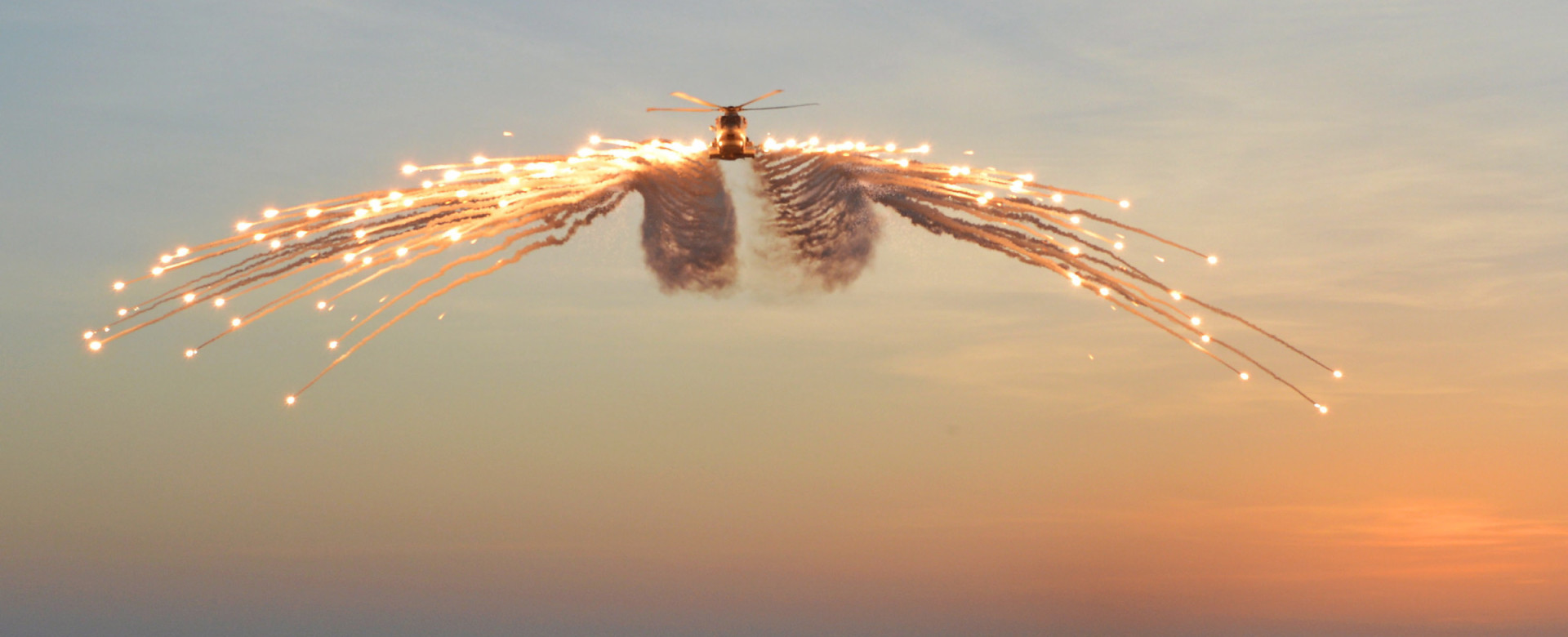 Merlin helicopter releasing decoy flares