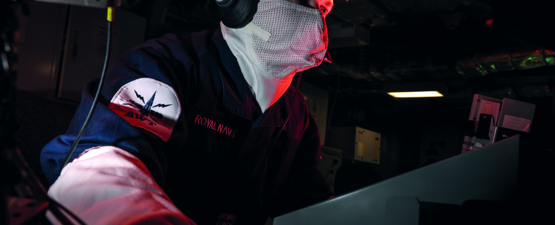 Royal Navy personnel in ship's ops room